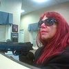 Red-Wigged, Gun-Toting Bank Robber Arrested&#8212;It's A Lady!